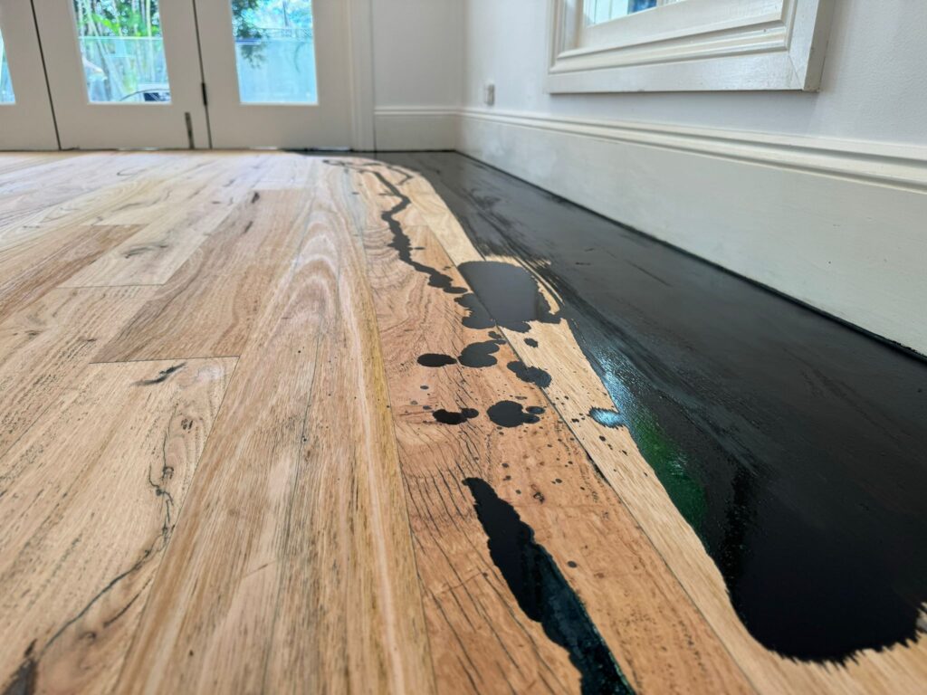 Wooden Floor being stained cleaning